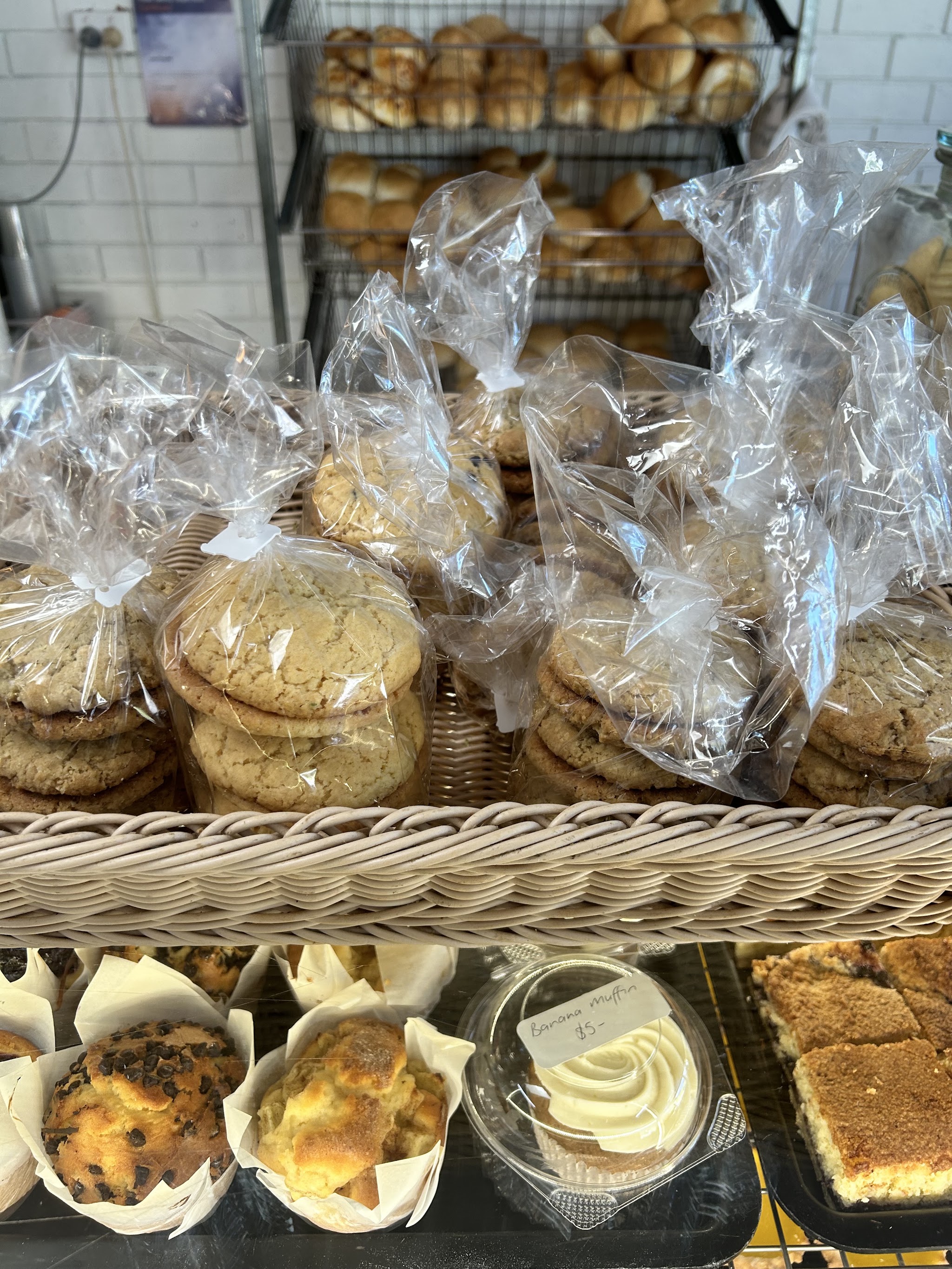 Cabinet of chocolate chip muffins, banana muffins and slices